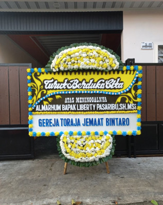 Papan Bunga Duka di Wirogunan