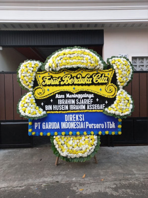 Papan Bunga Duka di Wirogunan